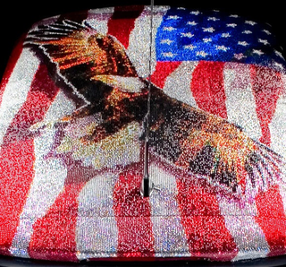Illustration for article titled Mini Cooper Covered In One Million Swarovski Crystals... Is Proud To Be An American?